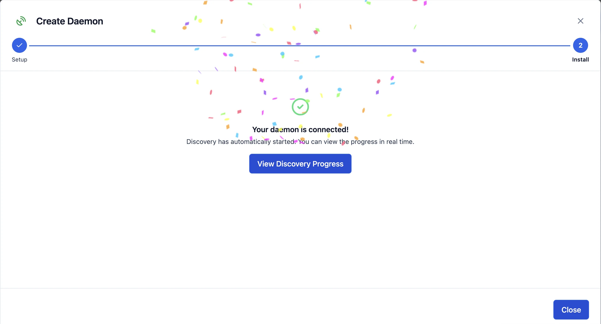 Daemon install screen showing dynamic CTA and confetti after successful connection